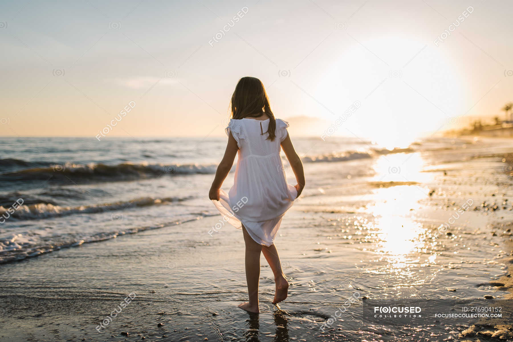 little white dress by the shore