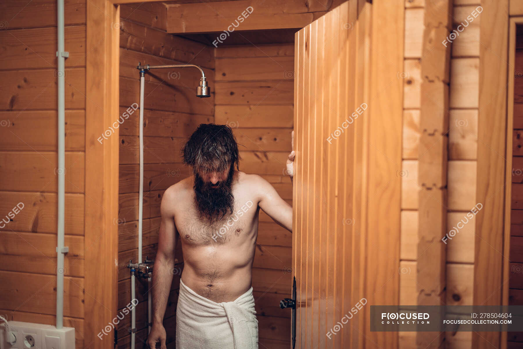 Man getting out of the shower — middle age, showering Stock Photo