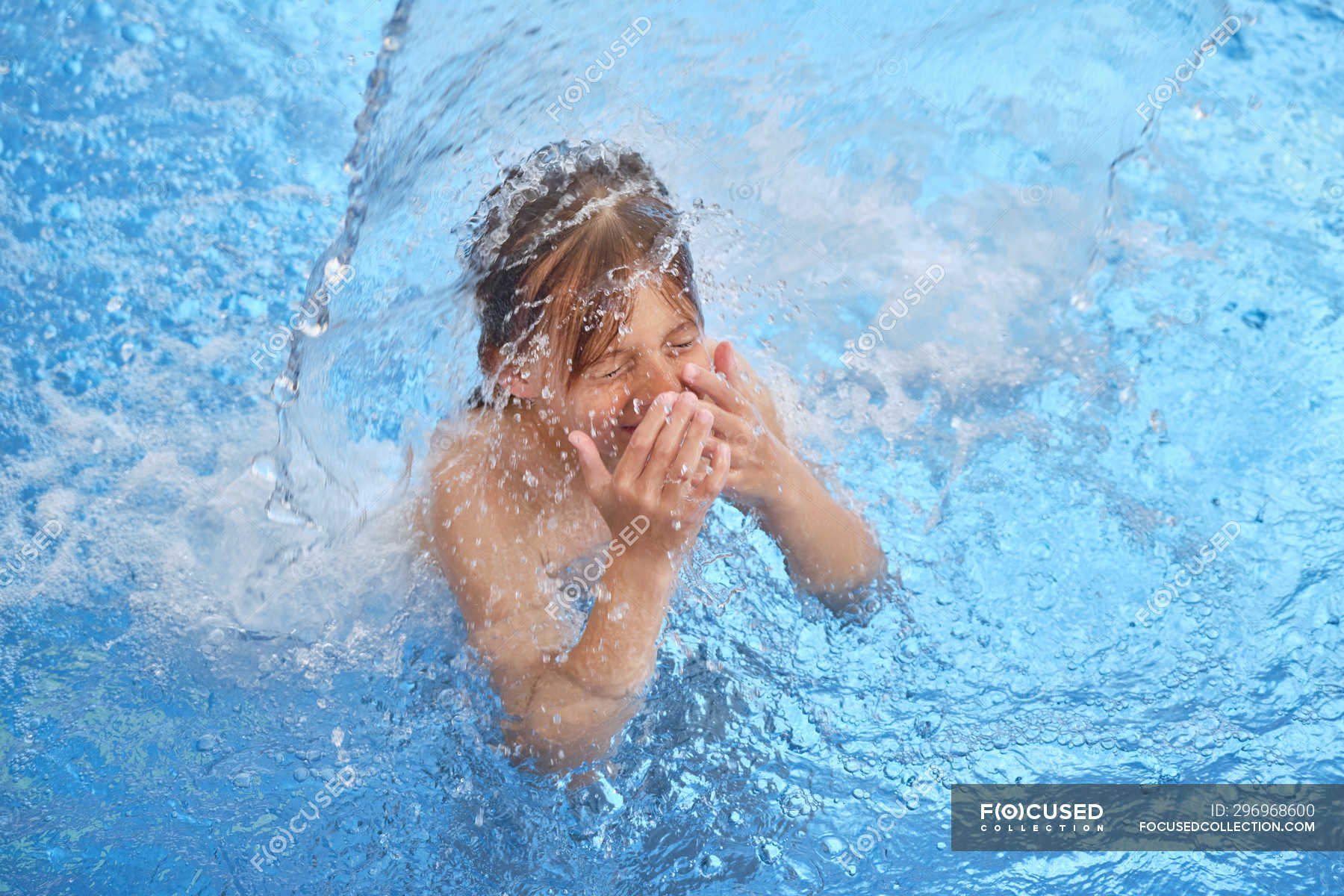 child-gasping-for-air-with-closed-eyes-and-open-mouth-while-floating