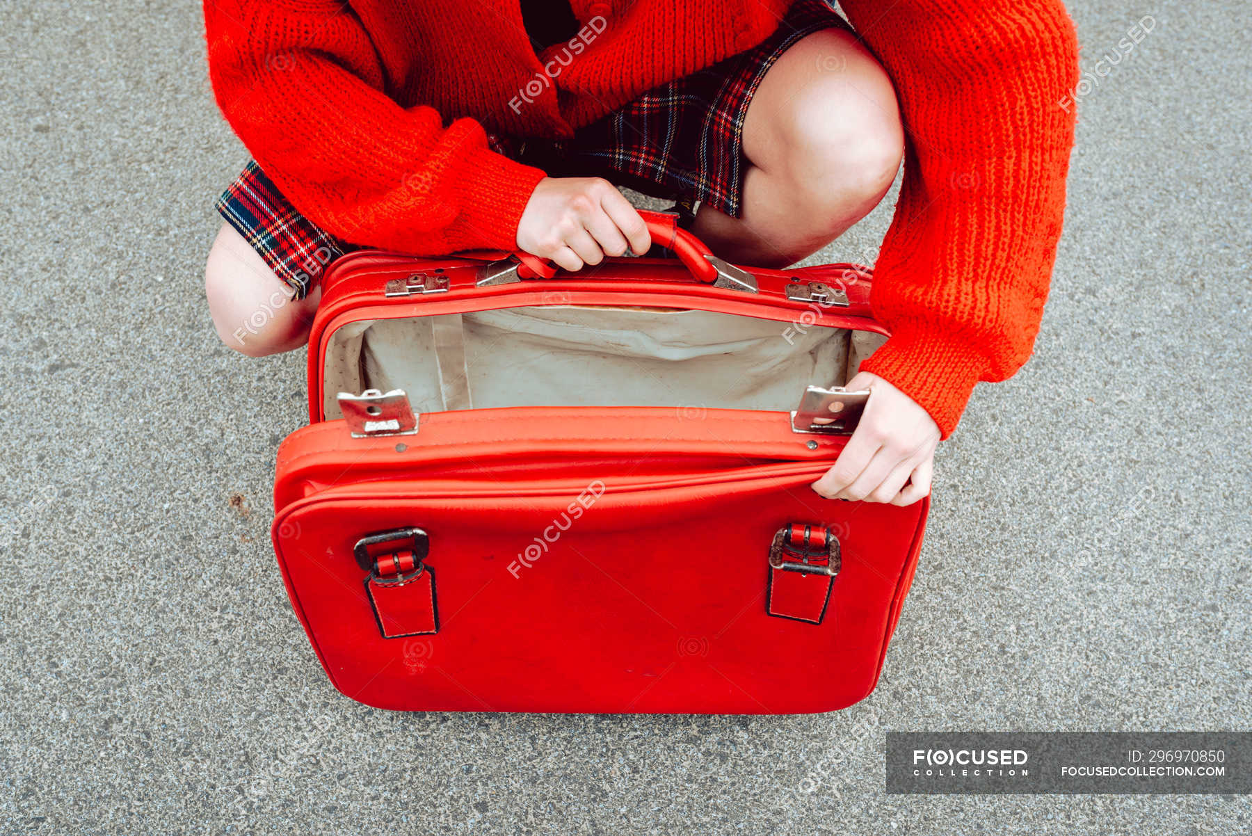 Closeup of female hands opening suitcase on road — baggage, fashion ...