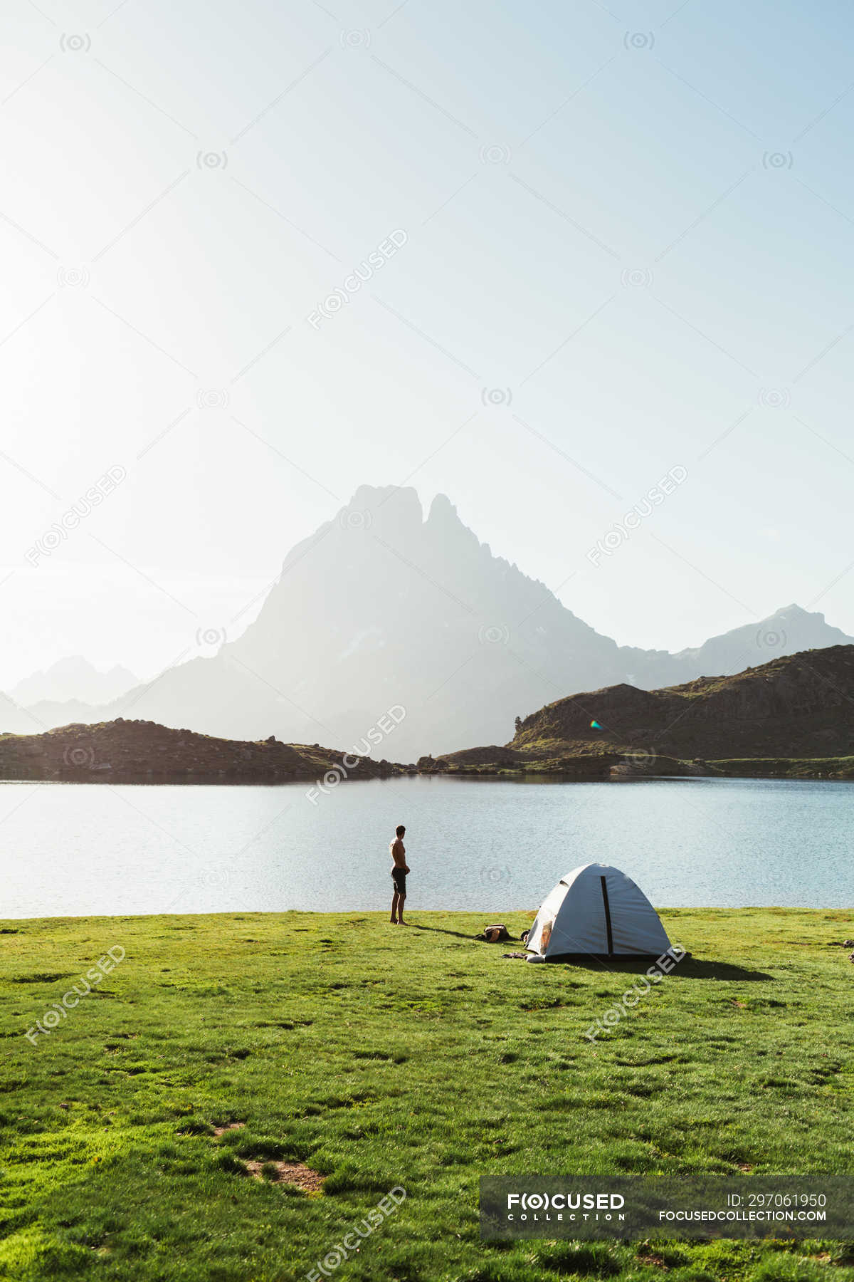Man Near The Tent In The Mountain Landscape Camp Stock Photo 297061950
