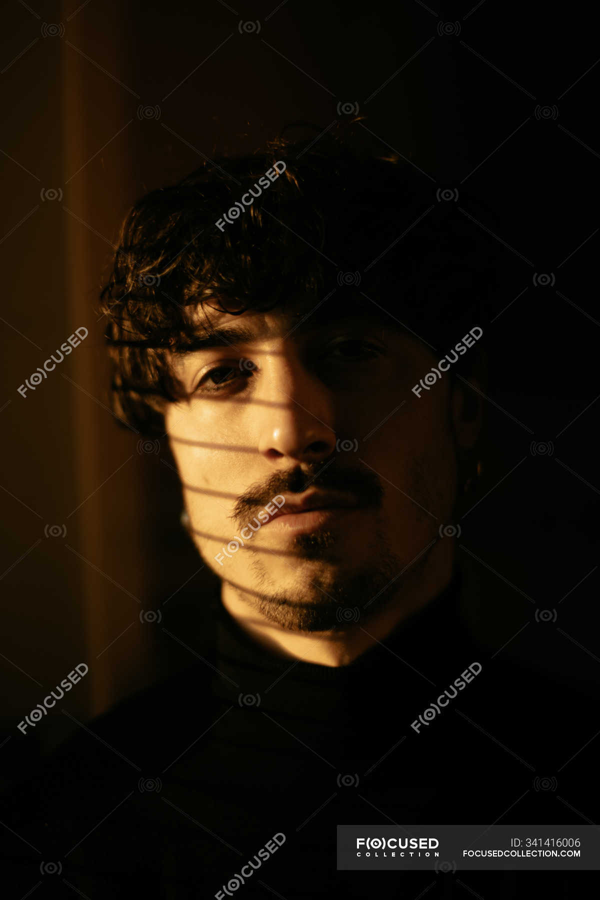 Young Melancholic Guy In Black Turtleneck Standing Next To Window With ...