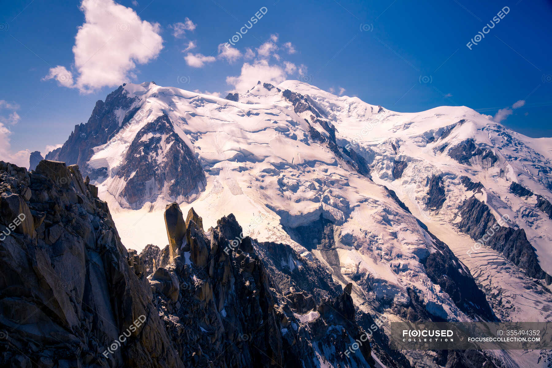 Snowy Rocky Peaks High In Sky In Bright Day In Chamonix Mont Blanc Rural Cliffs Stock Photo