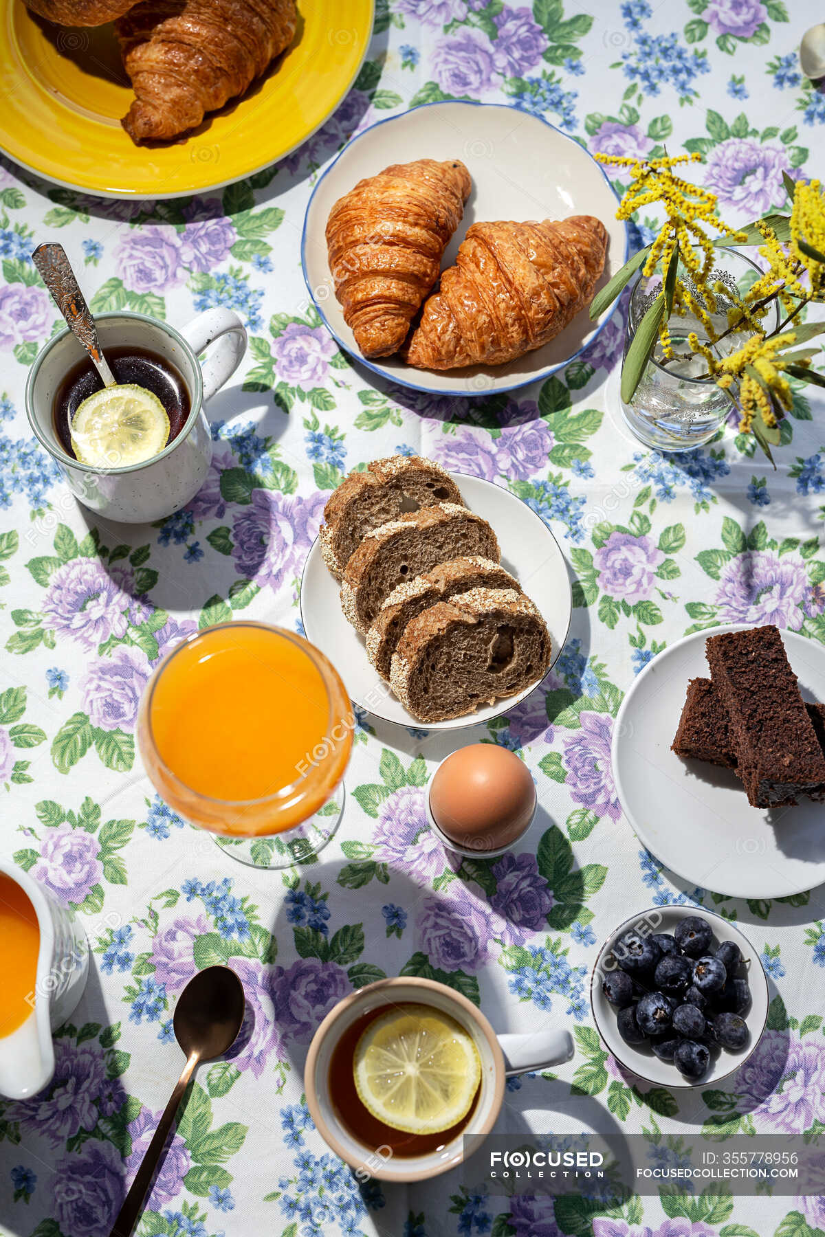 From above top view of homemade full brunch breakfast in sunlight with ...