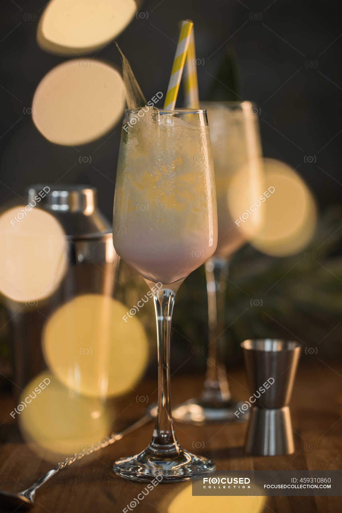 From Above Composition Of Sweet Classic Pina Colada Cocktails Served On Bar Counter Near Shaker And Jigger Rum Fresh Stock Photo 459310860