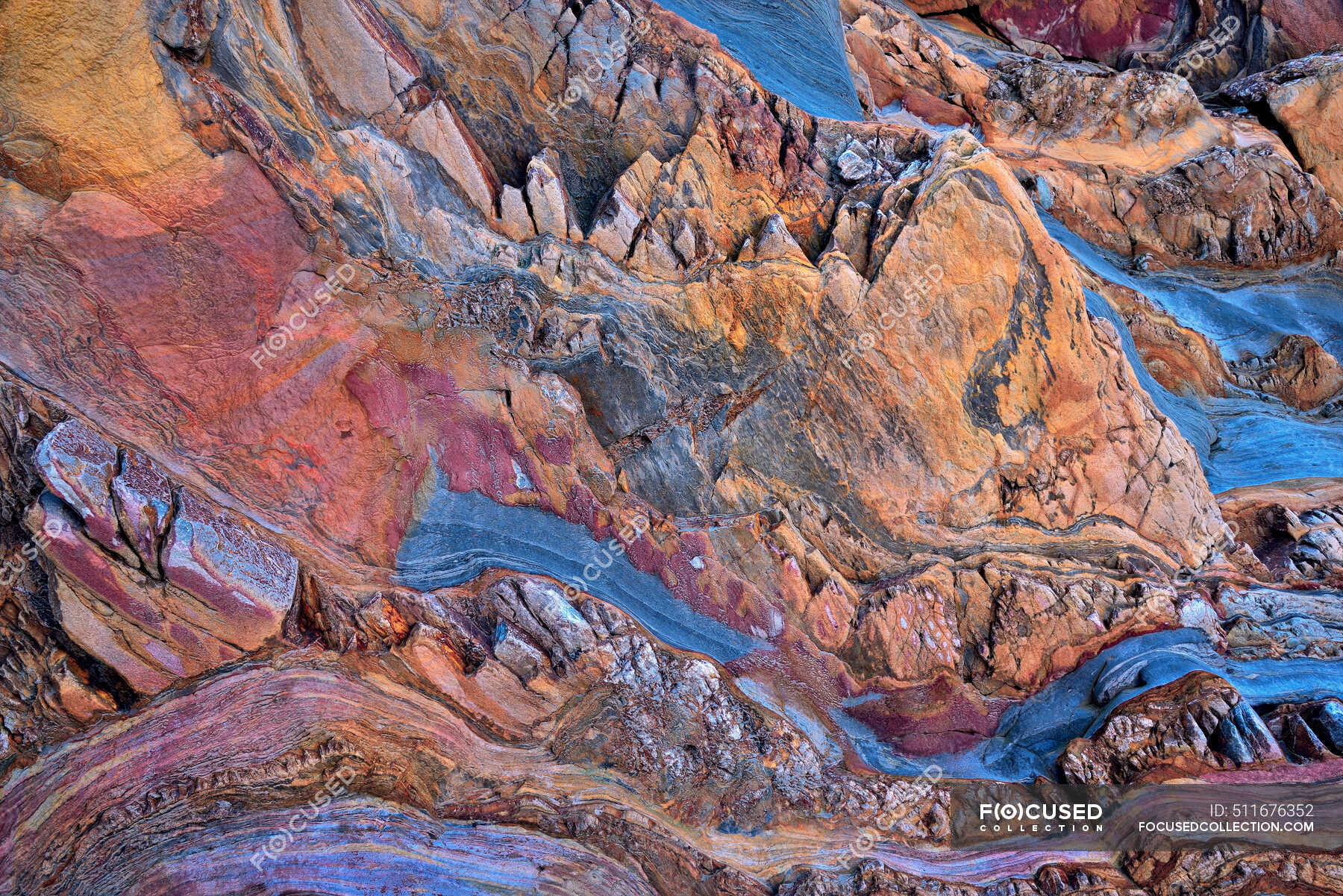 Rough textured background of rock sedimentary of blue and pink colors ...