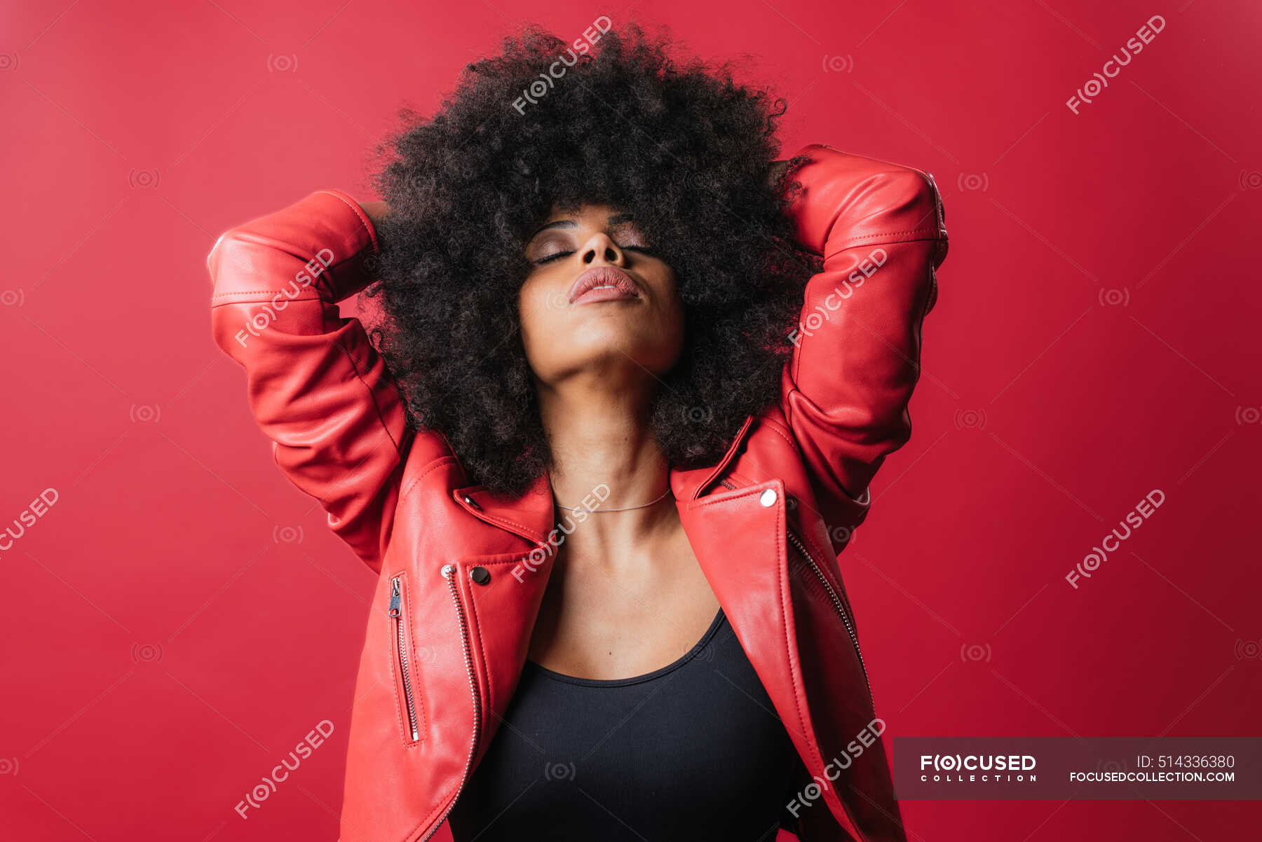 Naughty African American Female Screaming And Touching Hair On Red