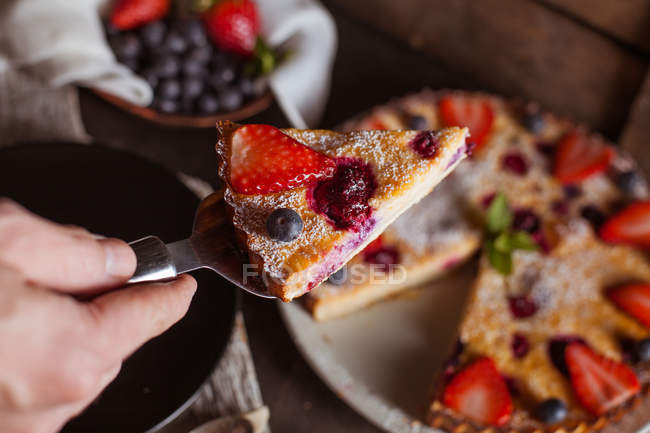 Piece of cheesecake with berries — Stock Photo