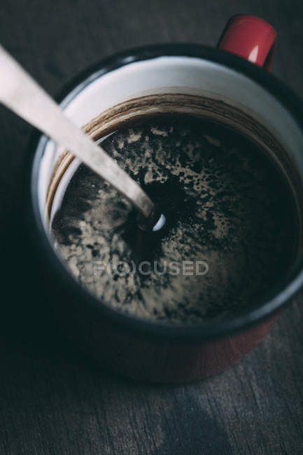 Metalic cup of black coffee — Stock Photo