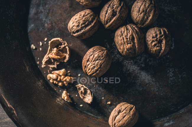 Walnuts in metallic platter — Stock Photo