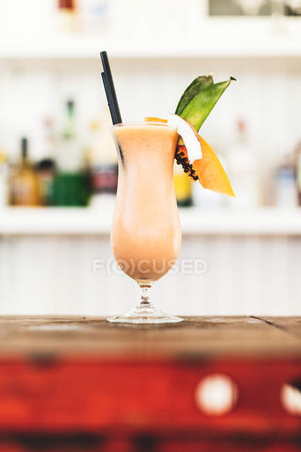 Tropical cocktail with fruits — Stock Photo