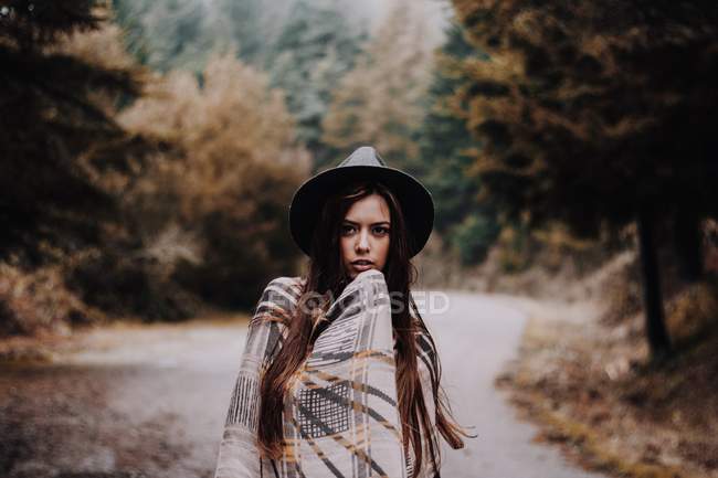 Attractive young girl in hat — Stock Photo