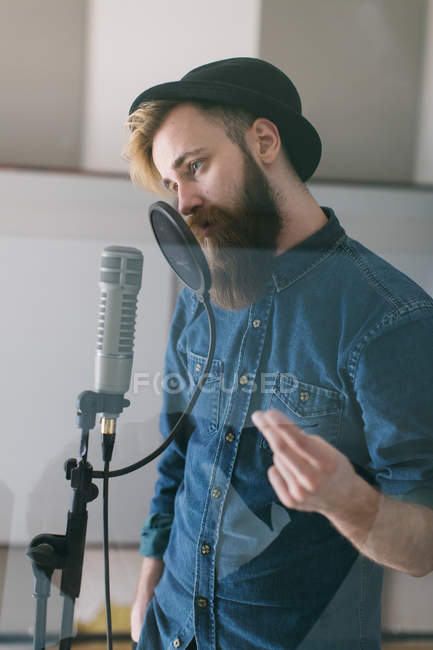 Young man in studio — Stock Photo