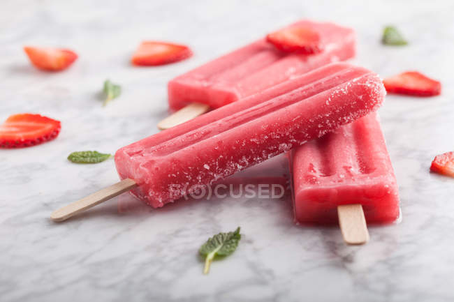 Stack of frozen popsicles — Stock Photo
