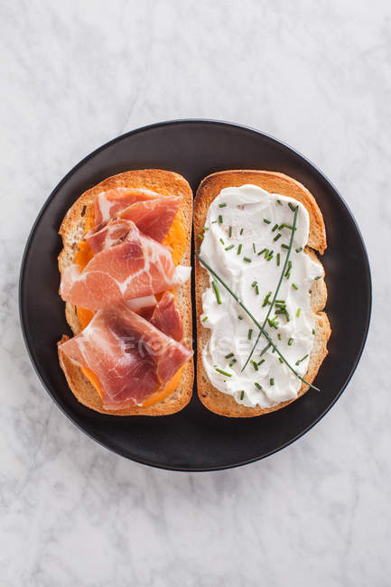 Sandwiches with cream and ham — Stock Photo