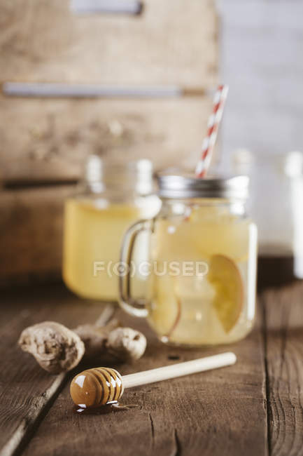 Ginger water cocktail in glass cans — Stock Photo