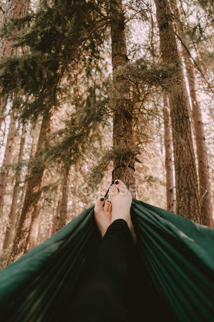 Female feet in hammock — Stock Photo