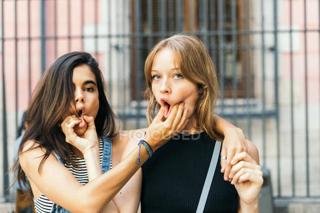 Two young crazy girls having fun — Stock Photo