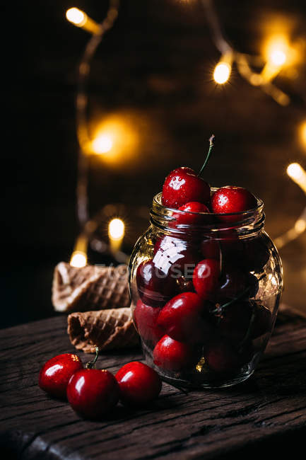 Ripe cherries in jar — Stock Photo