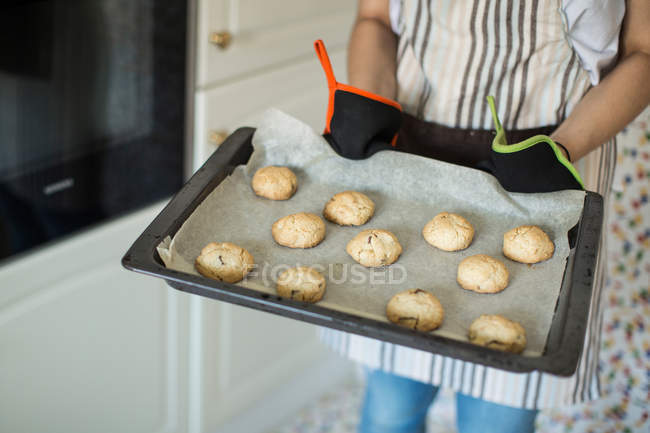 Person with homemade cookies — Stock Photo