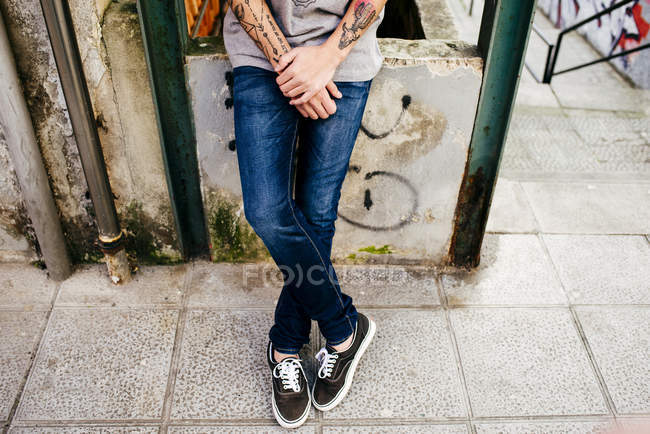 Crop hipster posing on street — Stock Photo