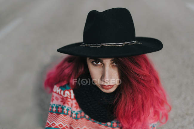 Girl with pink hair in hat — Stock Photo