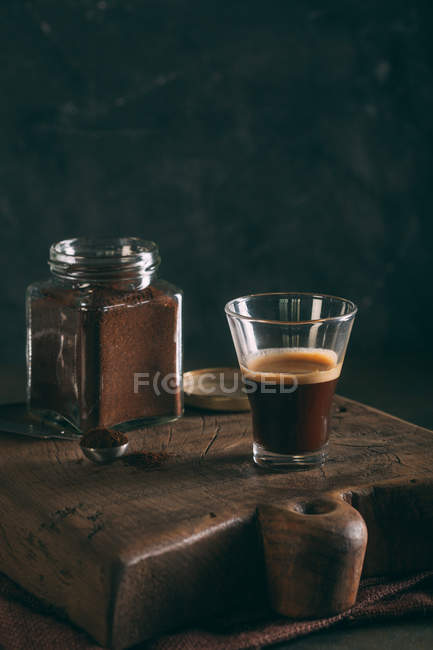 Black coffee in glass — Stock Photo