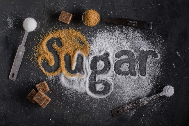 Tres tipos de azúcar - foto de stock