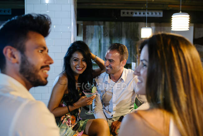 People drinking in bar — Stock Photo