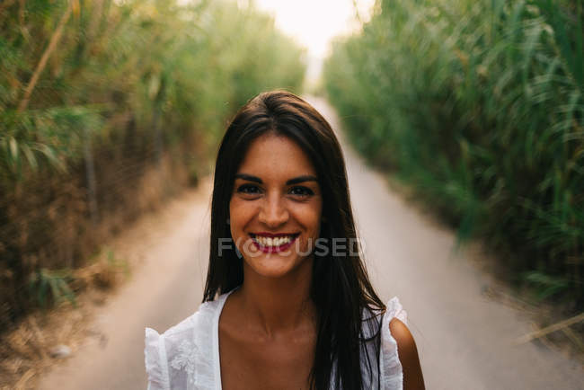 Young woman in garden — Stock Photo