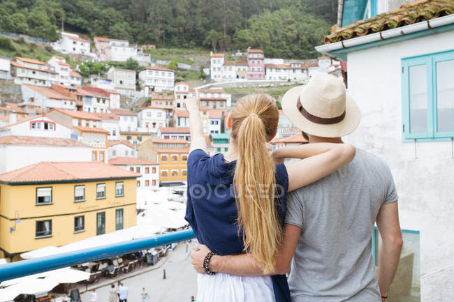 Couple looking at beautiful village. — Stock Photo