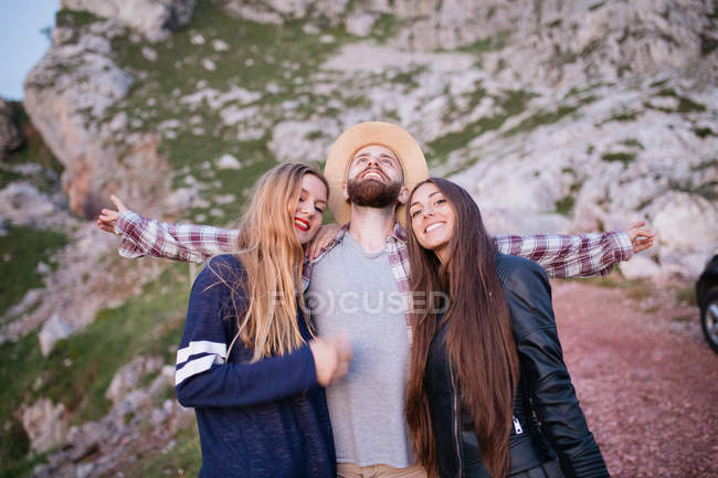 Three friends hugging — Stock Photo