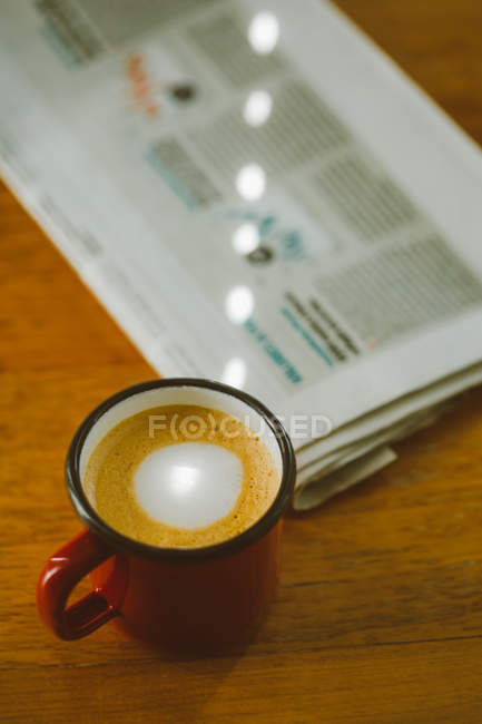 Espresso coffee in enamel cup — Stock Photo