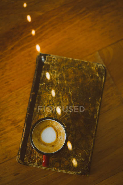 Espresso coffee in enamel cup — Stock Photo