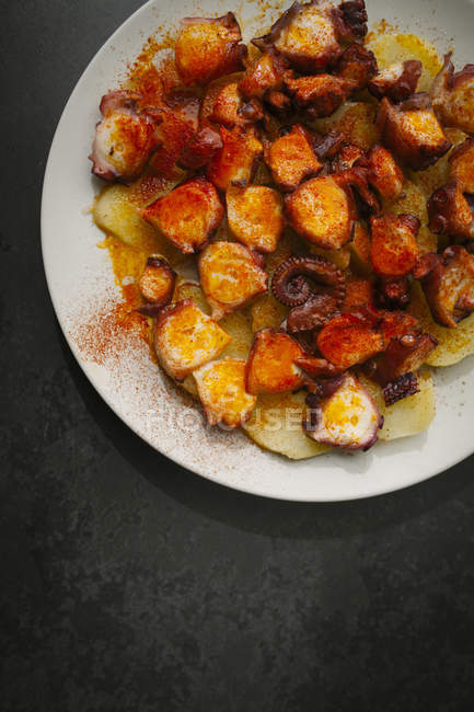 Typical spanish tapa with octopus — Stock Photo