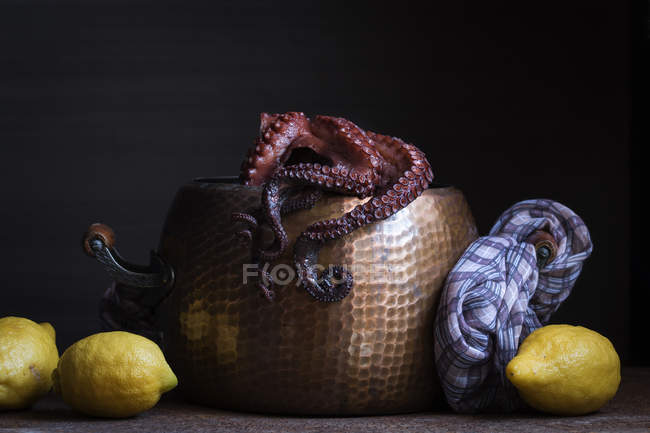 Boiled octopus in a stewpan — Stock Photo