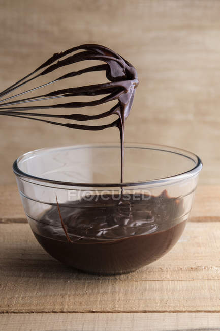 Chocolate ganache in a bowl for cakes — Stock Photo