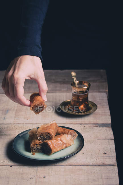 Cup of tea with sweet pastry — Stock Photo