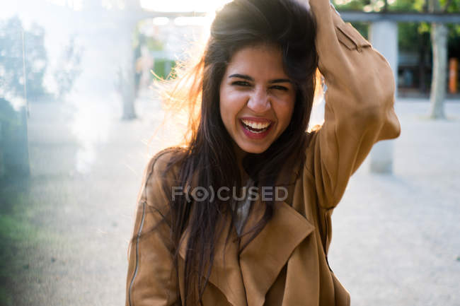 Young pretty woman in the street — Stock Photo