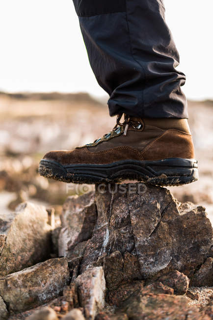 Crop shot of male trekking boot — Stock Photo