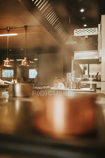 Steaming pots on stoves — Stock Photo
