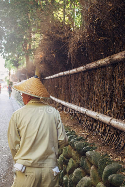 Person near fence — Stock Photo