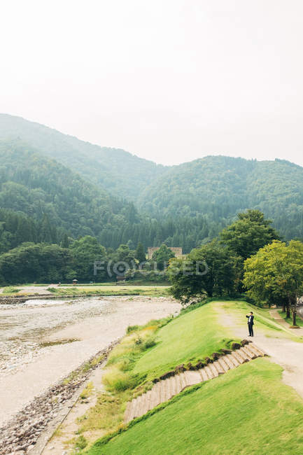 A person on a hill — Stock Photo