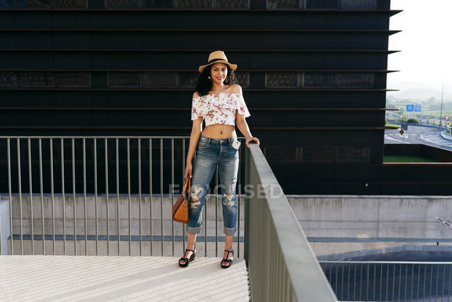 Pretty woman at handrails — Stock Photo