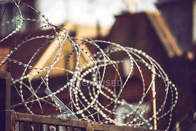 Fence with barbed wire — Stock Photo