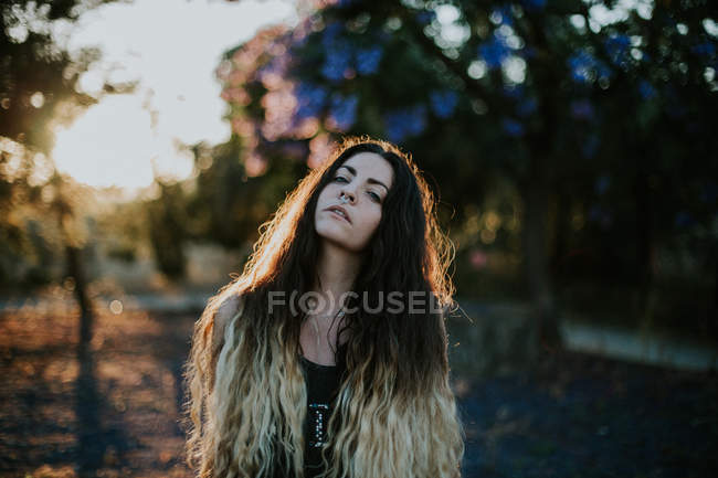 Portrait of provocative girl with nose piercing at evening dusk — Stock Photo