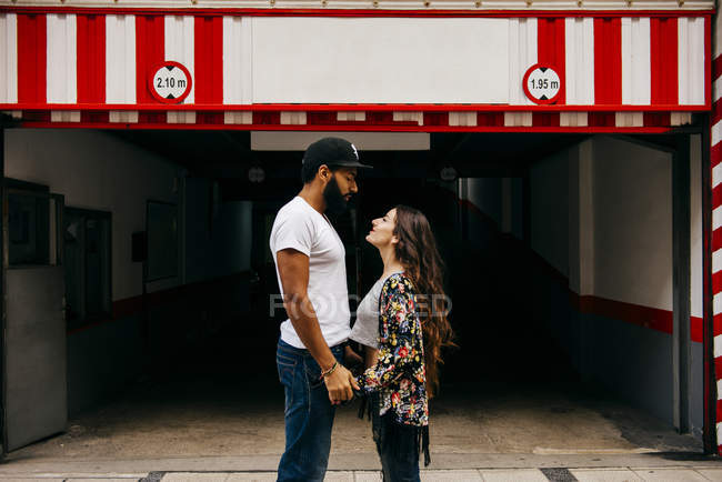 Loving couple posing on street — Stock Photo