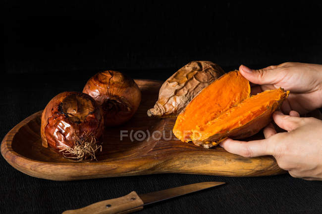 Baked onions and sweet potatoes — Stock Photo