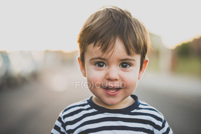 toddler boy with brown eyes