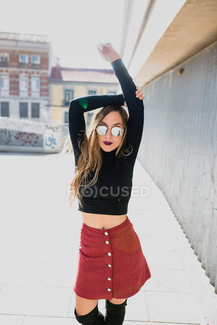 Girl posing with hands up — Stock Photo